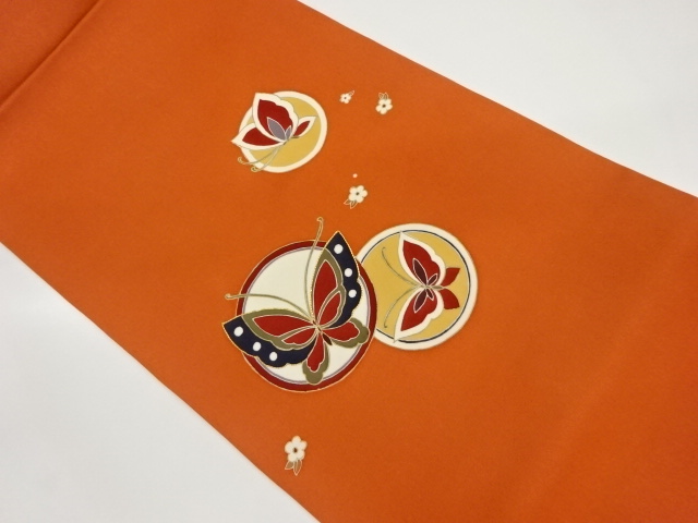 塩瀬金彩金駒刺繍丸文に蝶・小花模様名古屋帯